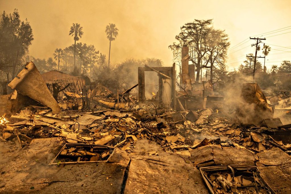 Eaton Fire destruction in Altadena near Pasadena, California, with burned homes, debris and fire-damaged trees.