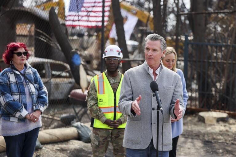 Governor Gavin Newsom signs wildfire recovery legislation in Altadena on September 15, 2026.